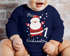 Baby Body langarm Mein erstes Weihnachten {style_variation_string} Aufdruck XMAS Outfit Newborn Einjährige Bio-Baumwolle Jungen & Mädchen MoonWorks®preview