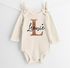 Baby Body personalisiert mit Namen und Herz Monogramm Initale Wunschname Geschenk Geburt Geburtstag Bio-Baumwolle SpecialMe®preview