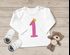 Baby Langarm-Shirt 1. Geburtstag Zahl 1 Krone Geburtstagsshirt Geburtstagsshirt Bio-Baumwolle Junge Mädchen MoonWorks®preview