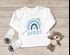 Baby Langarmshirt mit Namen personalisiert Regenbogen Scandi Stil Mädchen Jungen Bio-Baumwolle SpecialMe®preview