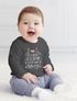 Baby Langarmshirt mit Spruch Weihnachten Das schönste Geschenk unterm Baum bin ich Babyshirt Jungen Mädchen Moonworks®preview