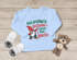 Baby Langarmshirt Weihnachtsshirt Spruch Das schönste Geschenk unterm Baum bin ich Babyshirt Weihnachtsmotiv MoonWorks®preview