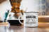 Emaille Tasse Becher So sieht ein richtig ein richtig cooler {style_variation_string} aus Berufe Kaffeetasse Moonworks®preview