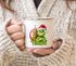 Emaille-Tasse Weihnachtsnörgler Weihnachtstasse Mann Frau mit Namen personalisierbar Geschenk lustig Weihnachtsmuffel Moonworks®preview