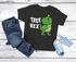 Kinder T-Shirt Weihnachten Dinoasaurier Tree Rex XMAS Outfit Weihnachtsshirt Jungen Mädchen Moonworks®preview