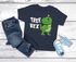 Kinder T-Shirt Weihnachten Dinoasaurier Tree Rex XMAS Outfit Weihnachtsshirt Jungen Mädchen Moonworks®preview